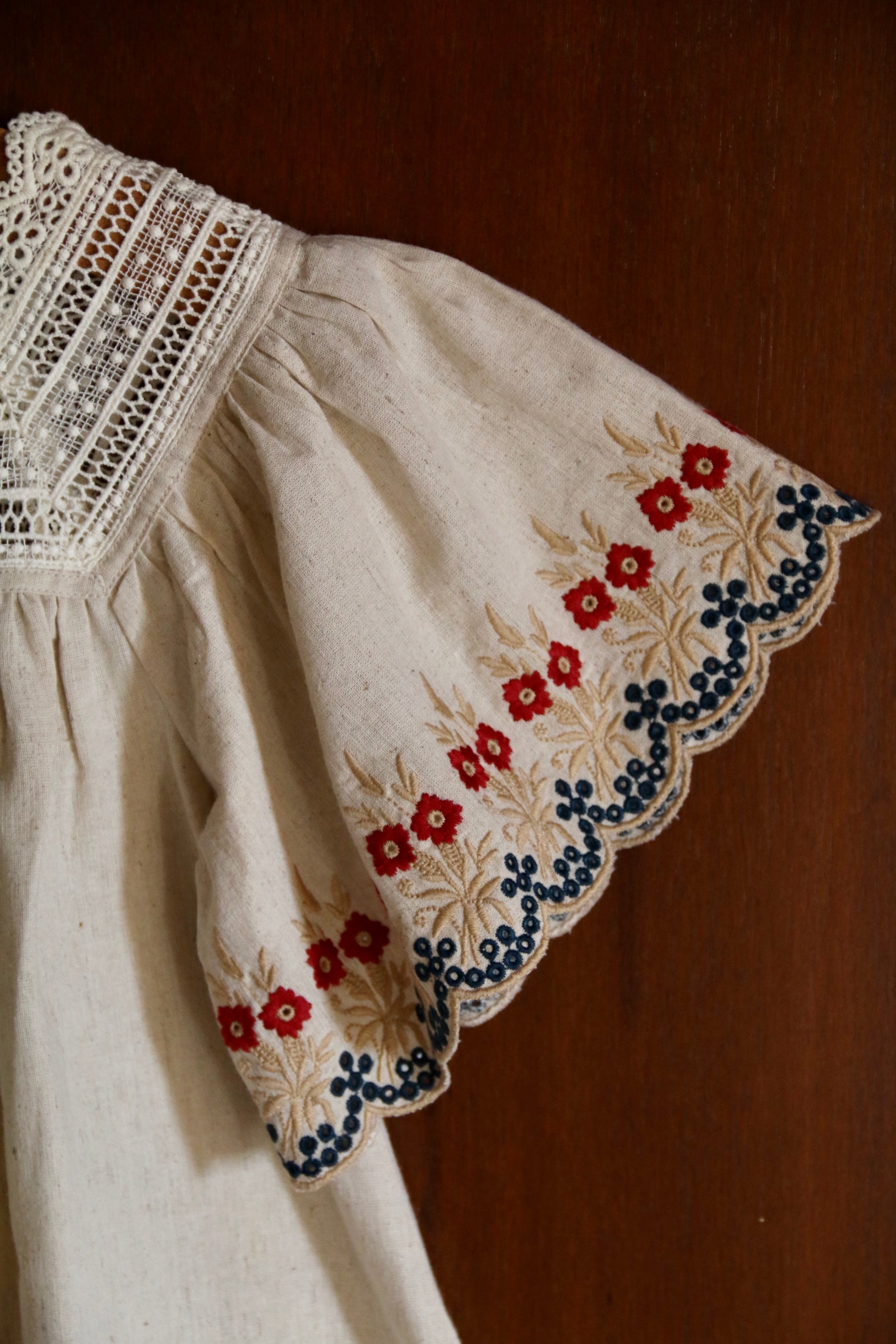 Dress Naural cotton flex with multi color eyelette emb.